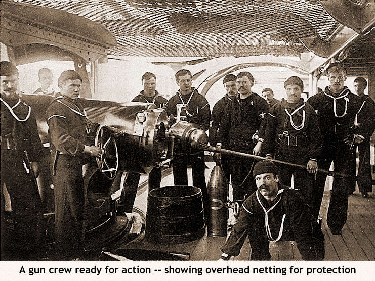 A gun crew ready for action -- showing overhead netting for protection -- CLICK HERE TO RETURN TO SMALL PICTURE